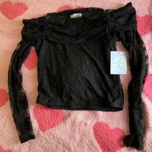 Lace off shoulder blouse.